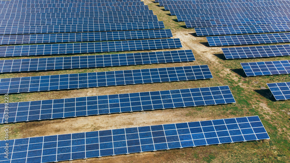 Fototapeta premium Solar panels in aerial view