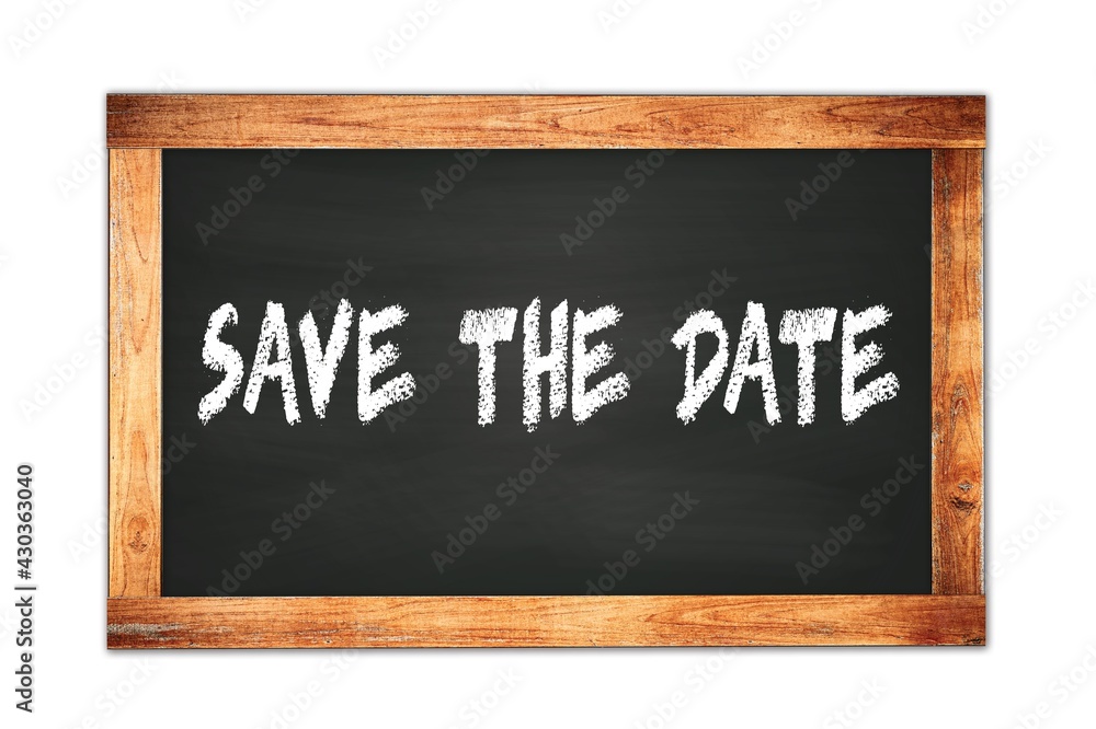 SAVE THE DATE text written on wooden frame school blackboard. SAVE THE DATE text written on wooden frame school blackboard.