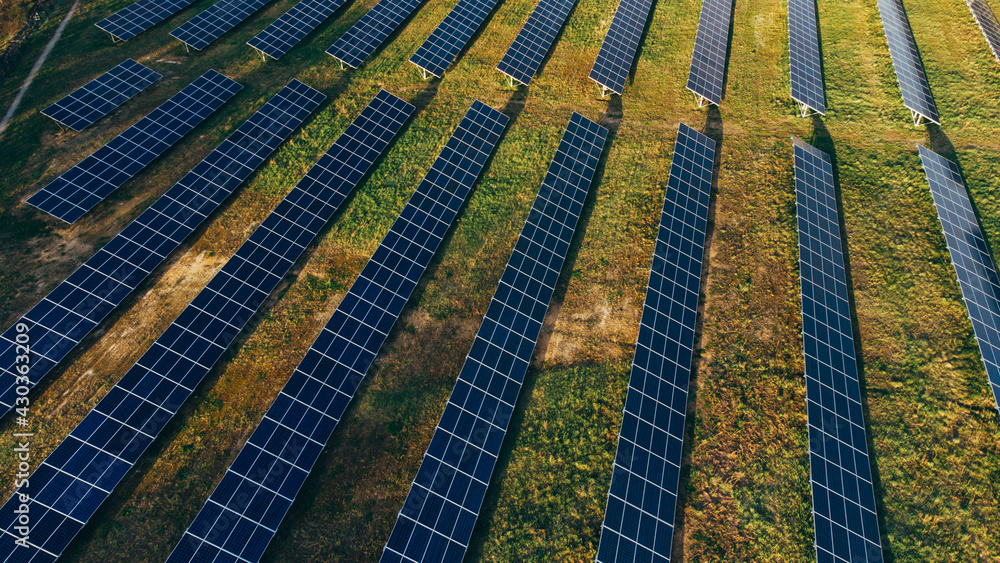 Solar panels in aerial view. Solar panels system power generators from sun Solar panels in aerial view. Solar panels system power generators from sun
