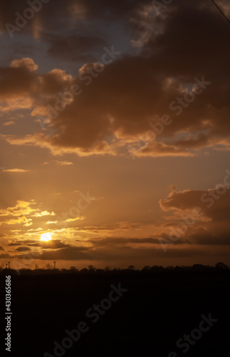 sunset in the sky with clouds 