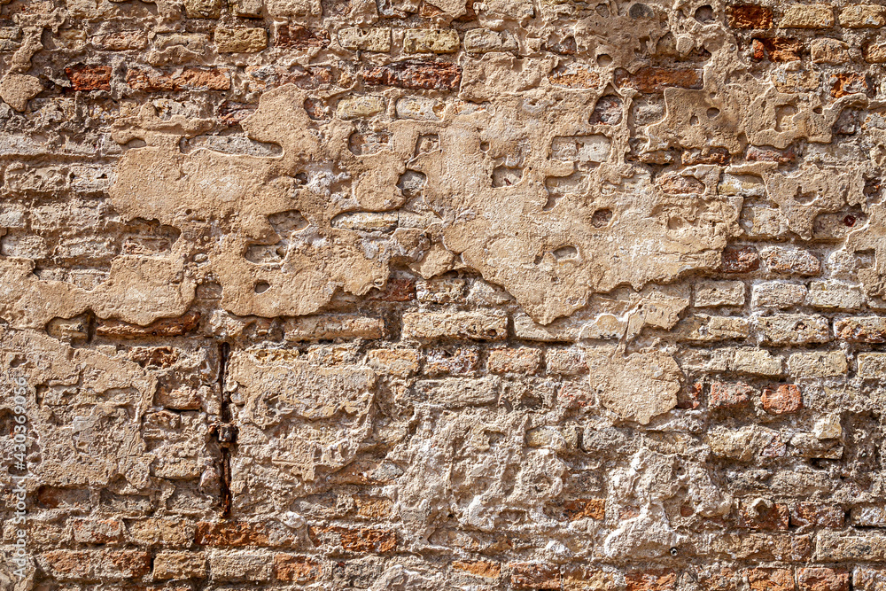 Old brick and plaster wall texture background Old brick and plaster wall texture background