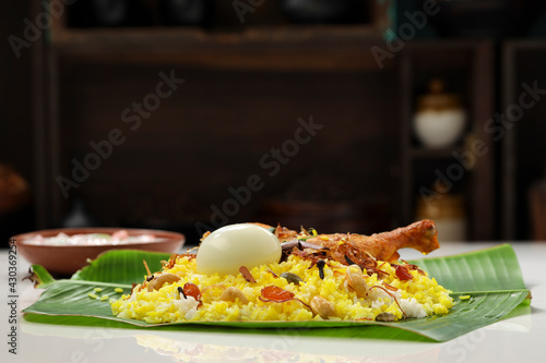 Chicken dum  Biryani_Indian Biriyani_wooden background