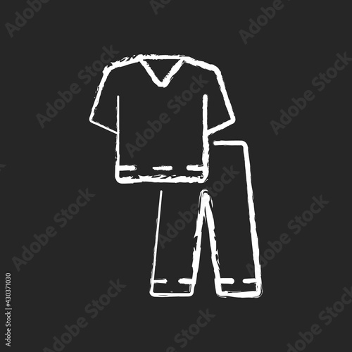Scrub suit chalk white icon on black background. Top and trousers for nurse. Suit to work in clinic. Protective wear for hospital professional. Doctor uniform. Isolated vector chalkboard illustration