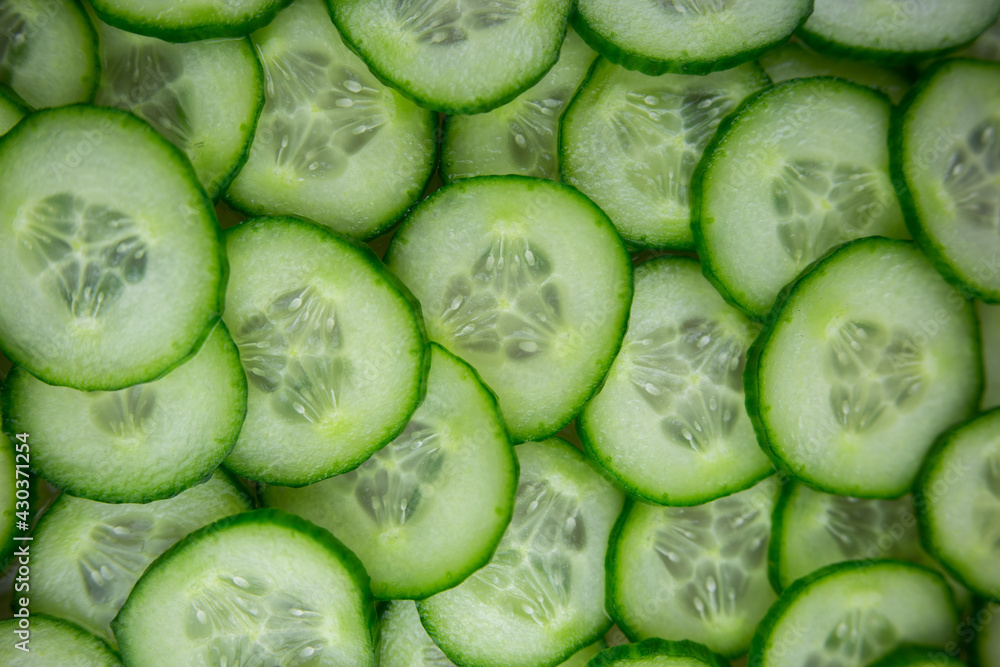 background of chopped fresh cucumbers for the kitchen background of chopped fresh cucumbers for the kitchen