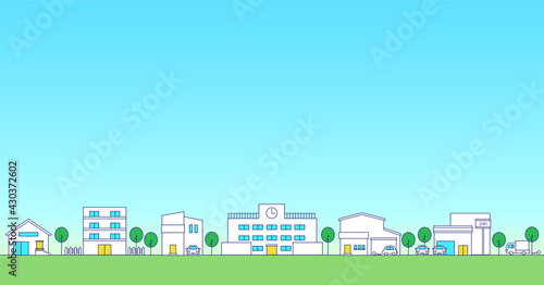 シンプルな街並みと学校の背景素材 青空
