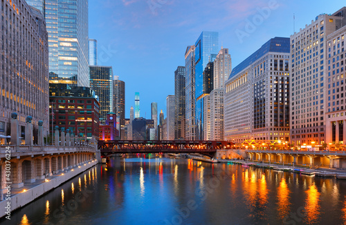 Chicago skyline after sunset showing Chicago downtown. Chicago, on Lake Michigan in Illinois, is among the largest cities in the U.S. 