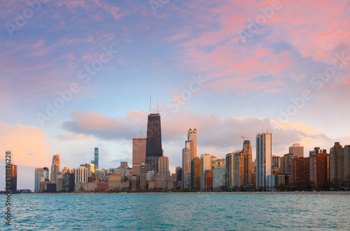 Chicago skyline after sunset showing Chicago downtown viewing from North Avenue beach . Chicago, on Lake Michigan in Illinois, is among the largest cities in the U.S.  © jayyuan