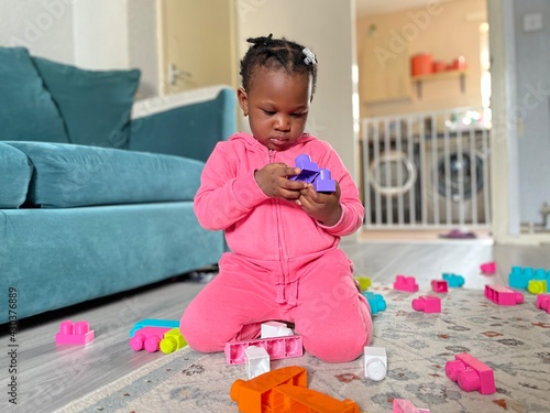 baby playing with blocks