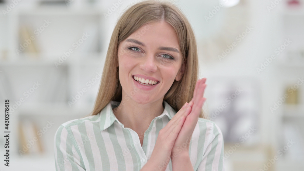 Portrait of Excited Young Woman Clapping Portrait of Excited Young Woman Clapping