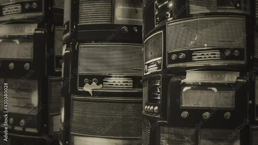 Towers of Old Radios Flickering Lights Retro Technology. Pile of