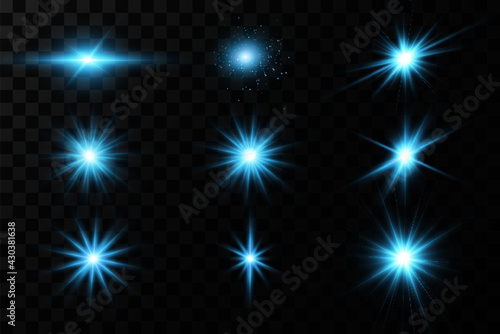 Bright particles, burning blue lights, stars, lasers. Vector.