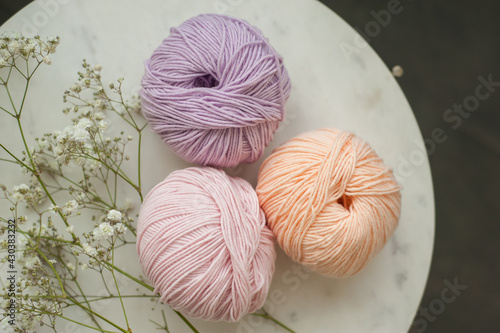 Yarn for knitting pastel shades. Close-up, knitting texture, needlework.