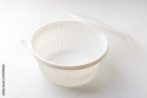 Plastic container on white background