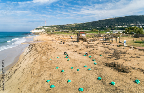 Aerial view of clean up after oil spill at Betzet nature reserve and Rosh-Hanikra beach in the distance, Northern District, Israel. photo