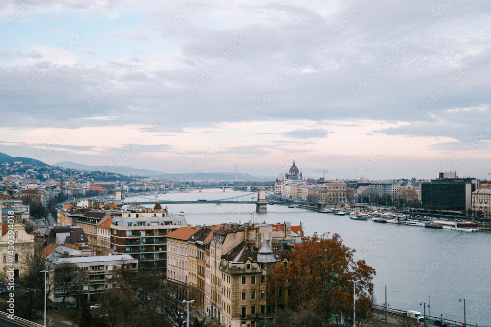 Panoramic view of old buildings on the embankment in Budapest against the background of the sky