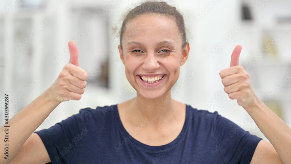 Portrait of Positive African Woman doing Thumbs Up Portrait of Positive African Woman doing Thumbs Up
