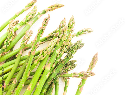 green asparagus on white background photo