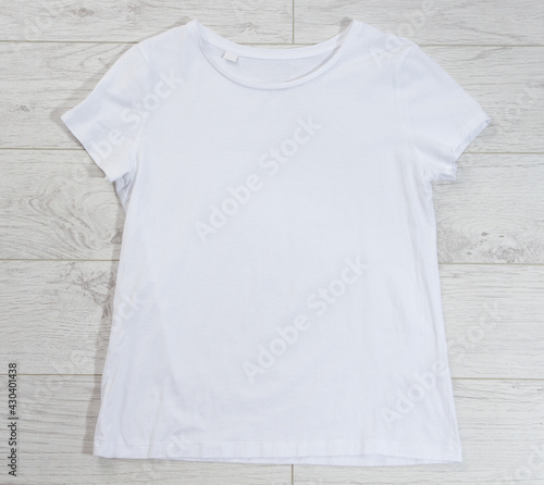 White t-shirt mock up top view background empty shirt