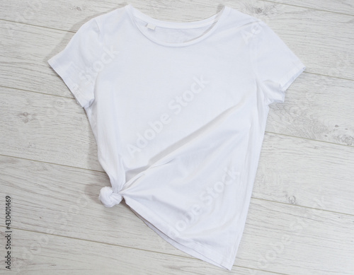 White t-shirt mock up top view background empty shirt © paulcannoby