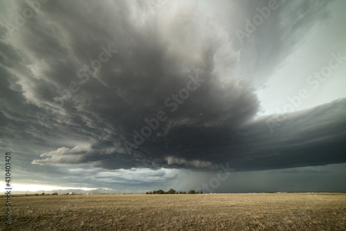 USA, Colorado, Colorado Springs, Tornadic storm clouds over plain photo