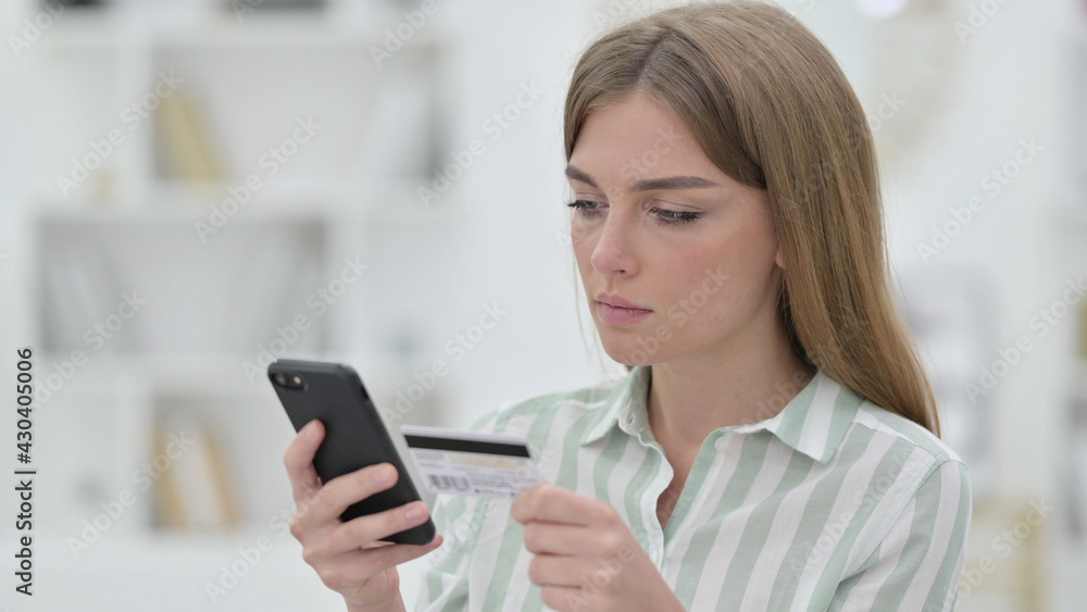 Portrait of Young Woman making Online Payment on Smartphone Portrait of Young Woman making Online Payment on Smartphone
