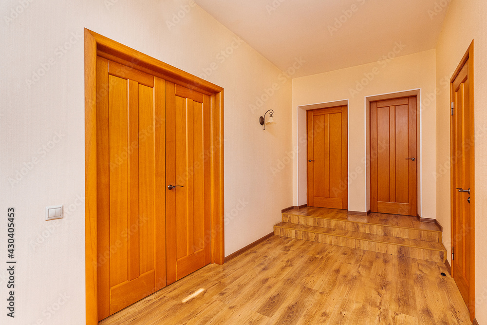 Fototapeta premium bright entrance hall with rooms and stairs