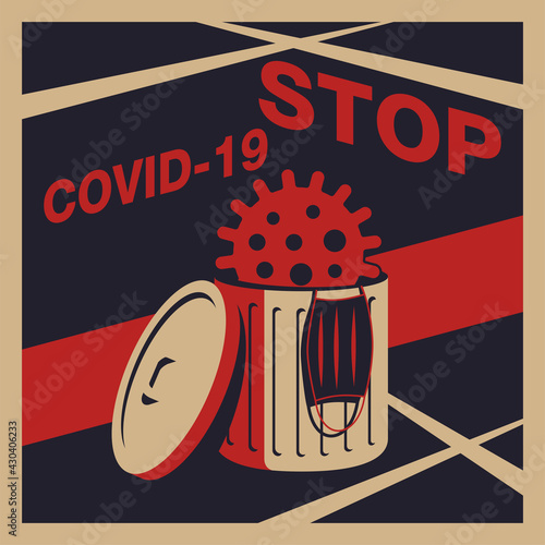 Stop COVID-19 - virus and face mask in thrash bin