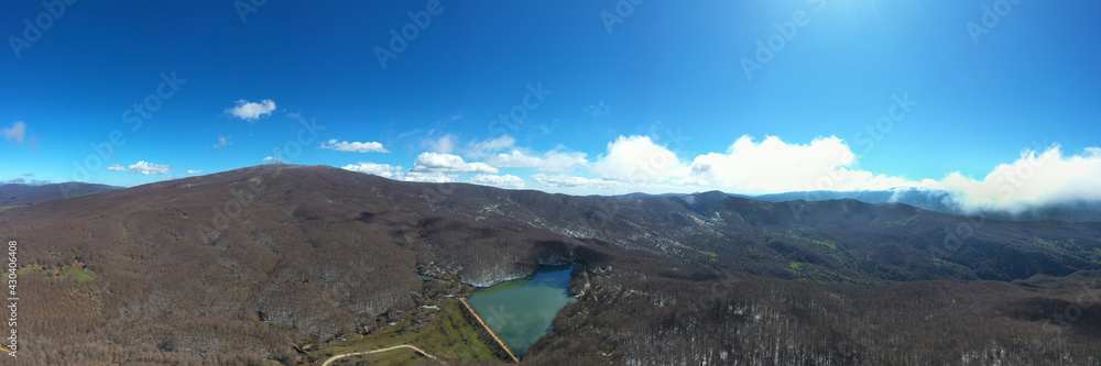 180 degrees virtual reality panorama of Maulazzo lake immersed in the beautiful beech forest of Monte Soro in winter on the Nebrodi, Sicily, Italy.