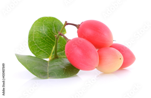 bengal-currants, carandas-plum, on a white background