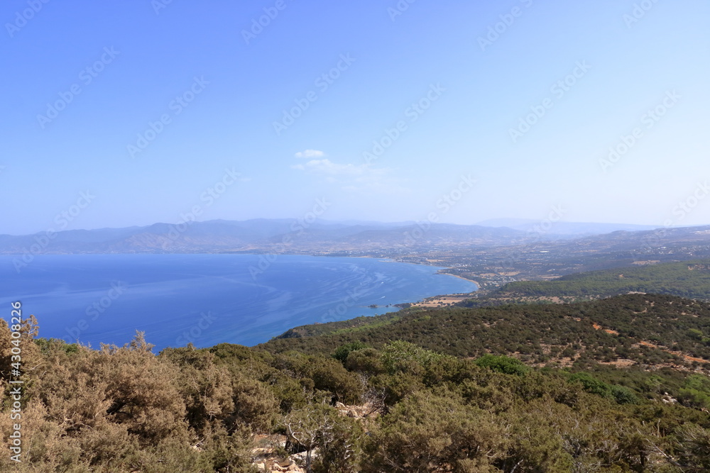 Looking across a campsite towards Latchi and Polis and the Troodos Mountains, Akamas Peninsula, Cyprus.