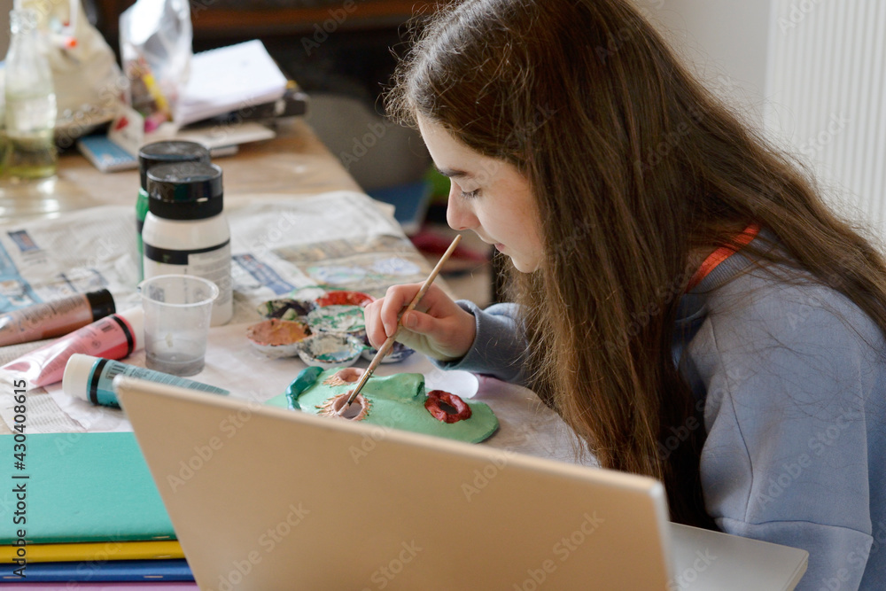 Girl painting at home Girl painting at home