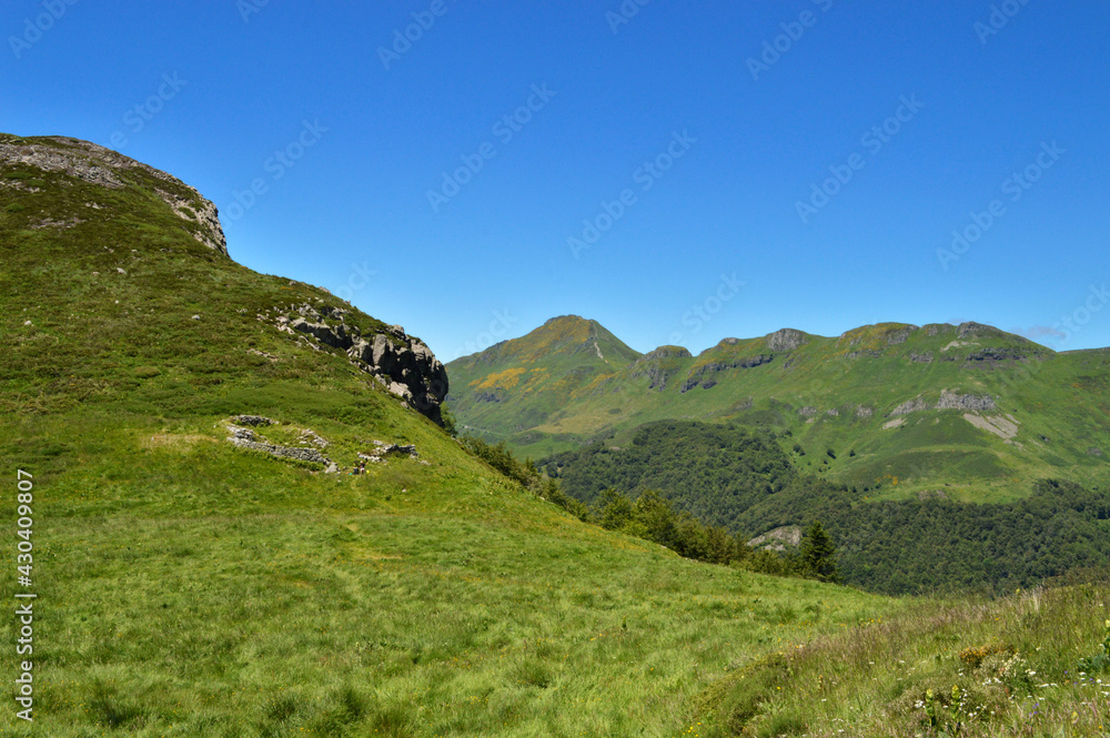 Magnificent view with volcanic mountains in a national park in a wild region , in Auvergne