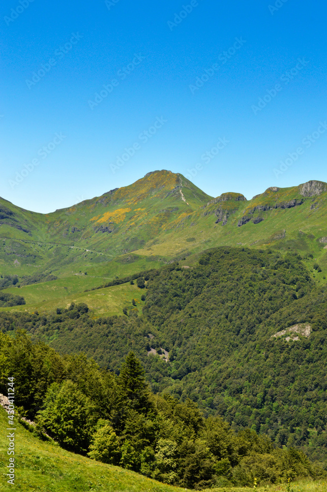 Magnificent view with a volcanic mountains in a national park in a wild region, in Auvergne