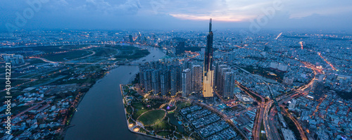 Panoramic drone view cityscape of Ho Chi Minh city with twilight sky