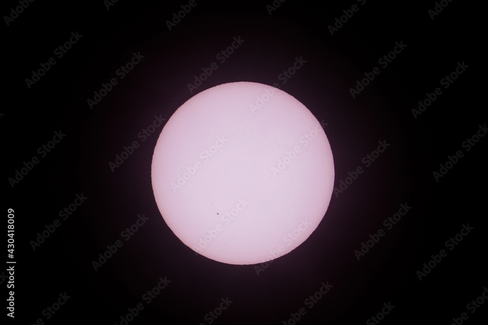 Close up telephoto of the sun in the sky with Sunspots AR2781 taken using a super telephoto lens. Shoot from East Java Indonesia 10 November 2021 2.08 pm.