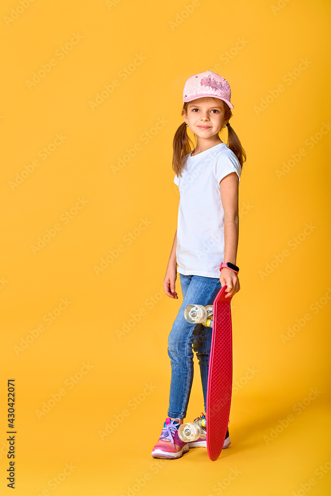 Stylish funny girl wearing white t-shirt, blue jeans and sneaker Stylish funny girl wearing white t-shirt, blue jeans and sneaker