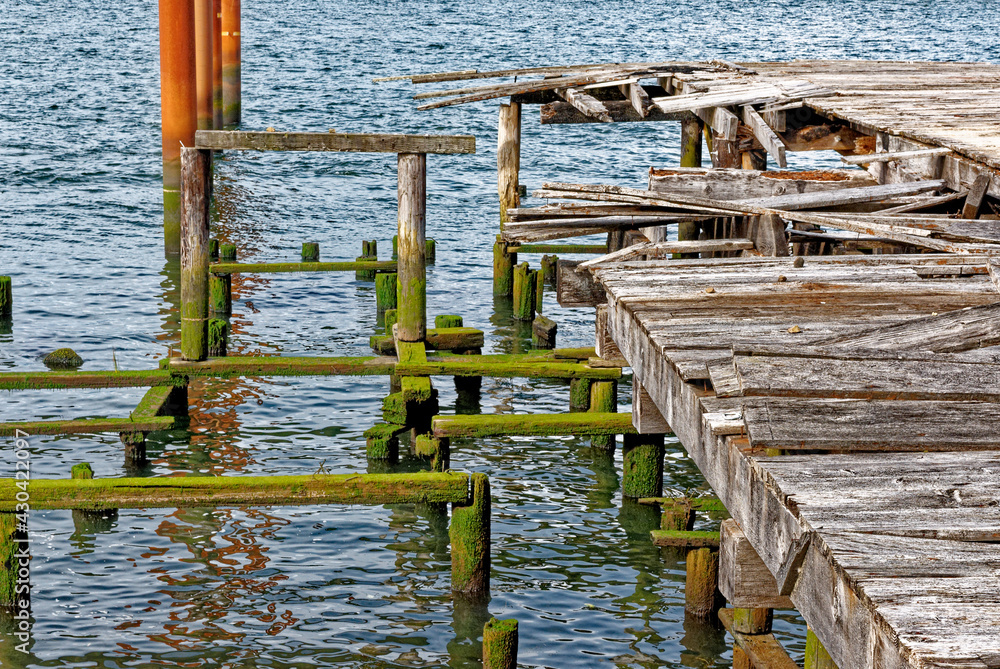 Remains of old piers in the Columbia River in Astoria - Oregon Remains of old piers in the Columbia River in Astoria - Oregon