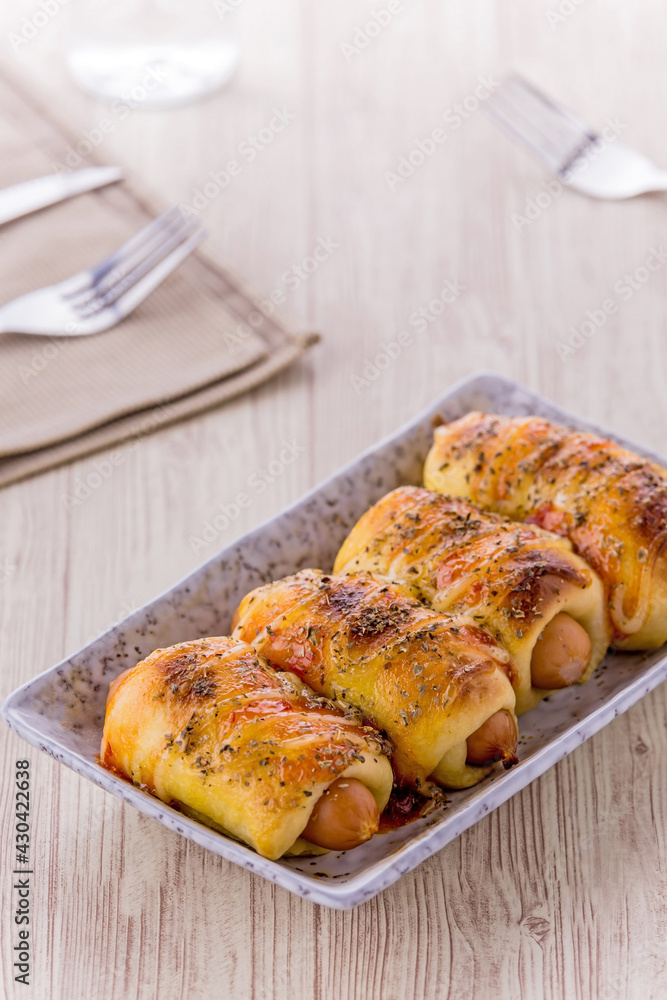 Mini pizza with sausage and cheese Mini pizza with sausage and cheese