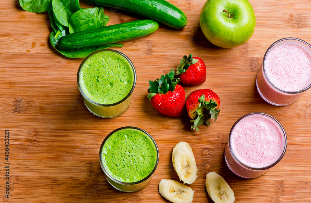 Smoothies. Green health shake with farm fresh organic fruits and vegetable. Persian cucumbers, Granny Smith apples and lettuce smoothie. Smoothies. Green health shake with farm fresh organic fruits and vegetable. Persian cucumbers, Granny Smith apples and lettuce smoothie.
