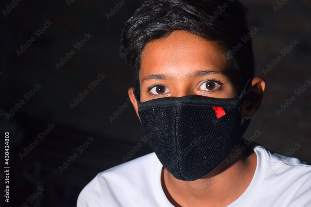 13 years old Asian cute boy wearing protective mask, prevention of Corona virus (Covid -19) and pollution 13 years old Asian cute boy wearing protective mask, prevention of Corona virus (Covid -19) and pollution