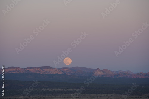 Pink moon over the mountains