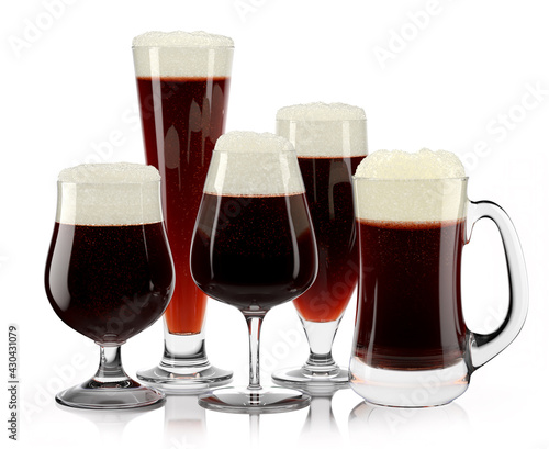 Set of fresh stout beer glasses with bubble froth isolated on white background.