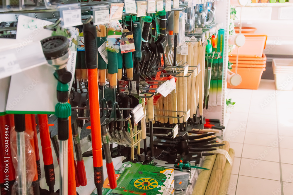 Gardening tools on the shelves of the store