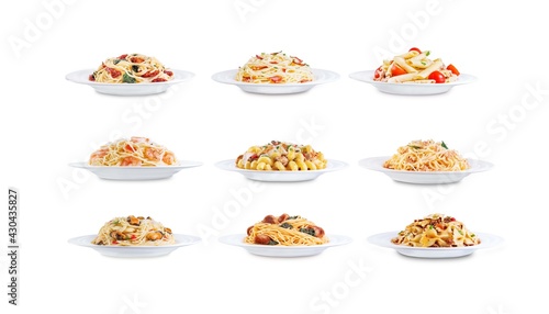 Set of pasta with meat, chicken, bacon; shrimp, tuna, mussels, tomatoes in a plate on a white isolated background