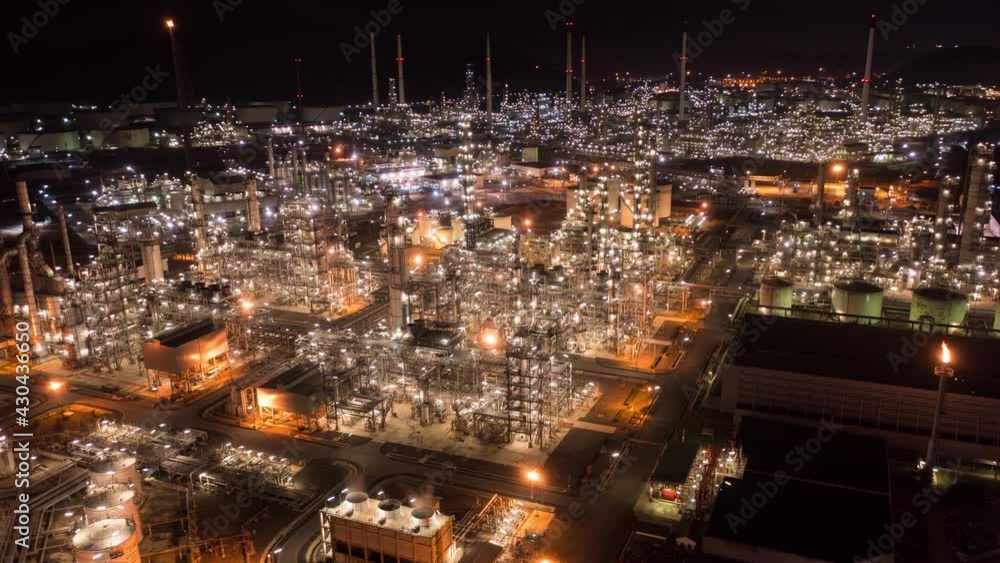 Hyperlapse Timelapse Aerial view drone of oil refinery terminal is industrial facility for storage of oil and petrochemical. oil manufacturing products. power electric plant. footage b roll time lapse Hyperlapse Timelapse Aerial view drone of oil refinery terminal is industrial facility for storage of oil and petrochemical. oil manufacturing products. power electric plant. footage b roll time lapse