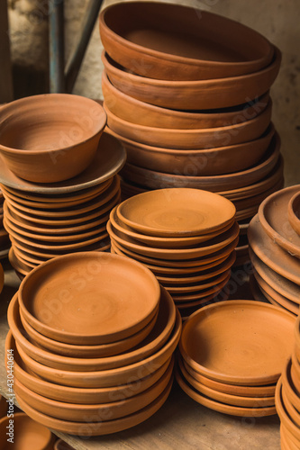 Mexican pottery handicrafts in clay  sculptures  vessels  jugs  vases etc  using traditional methods.