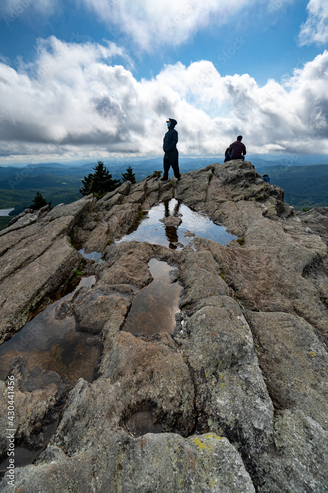 hiker on top of mountain