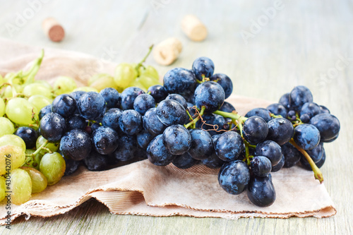 Bunch of white and blue grapes.