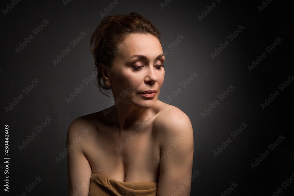 custom made wallpaper toronto digitalportrait of a sensual fifty year old woman on grey studio background