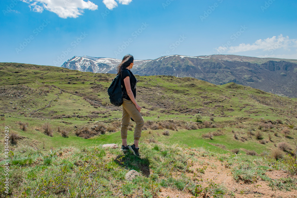 person walking in the countryside